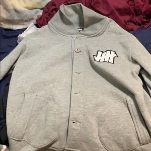 Undefeated varsity jacket size: medium